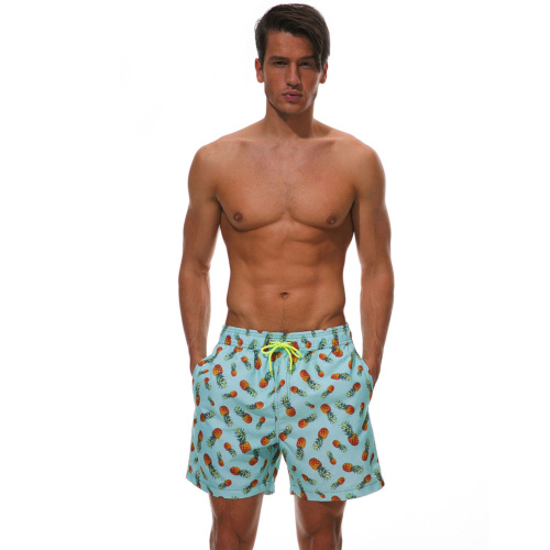 Голубые пляжные шорты с ананасами фото 4